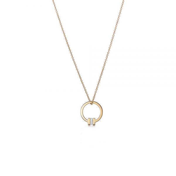 Tiffany T Pendant Necklaces in Gold with a Baguette Diamond