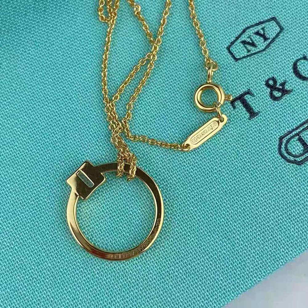 Tiffany T Pendant Necklaces in Gold with a Baguette Diamond (2)